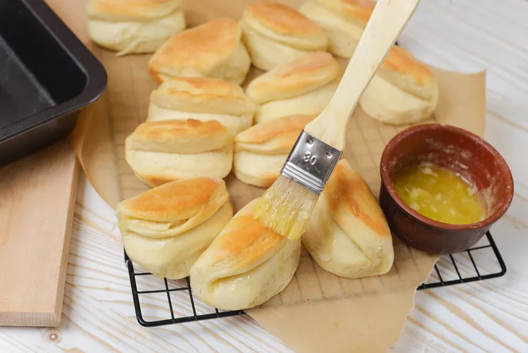 brush with more melted butter before serving