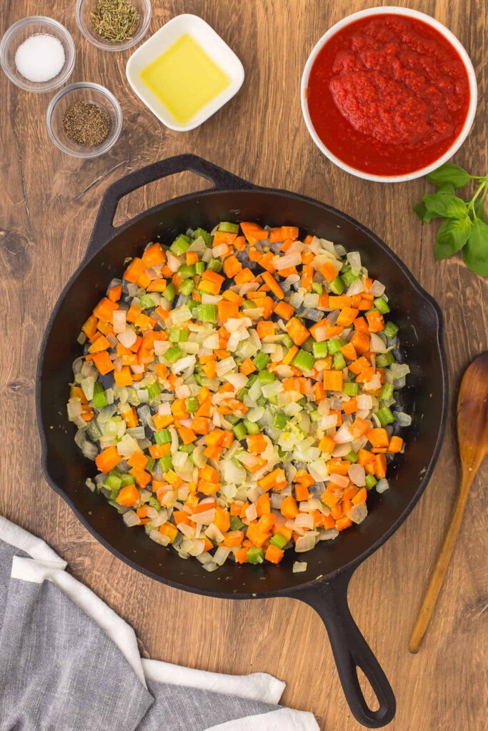 cook the onion, celery, carrots, and garlic until softened and tender
