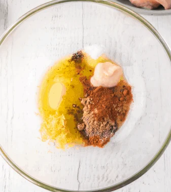 Add all marinade ingredients to a large mixing bowl and whisk until well combined