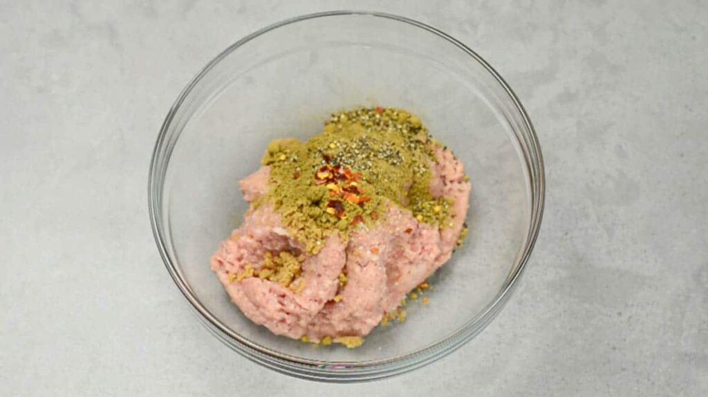 Cook the sausage in a large skillet over medium-high heat until it is browned and crumbly, allowing it to develop flavor as it cooks