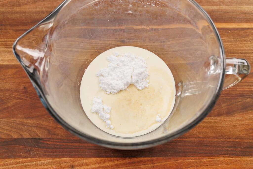 Add the cold heavy whipping cream, sugar, and vanilla extract to a large mixing bowl or the bowl of a stand mixer.