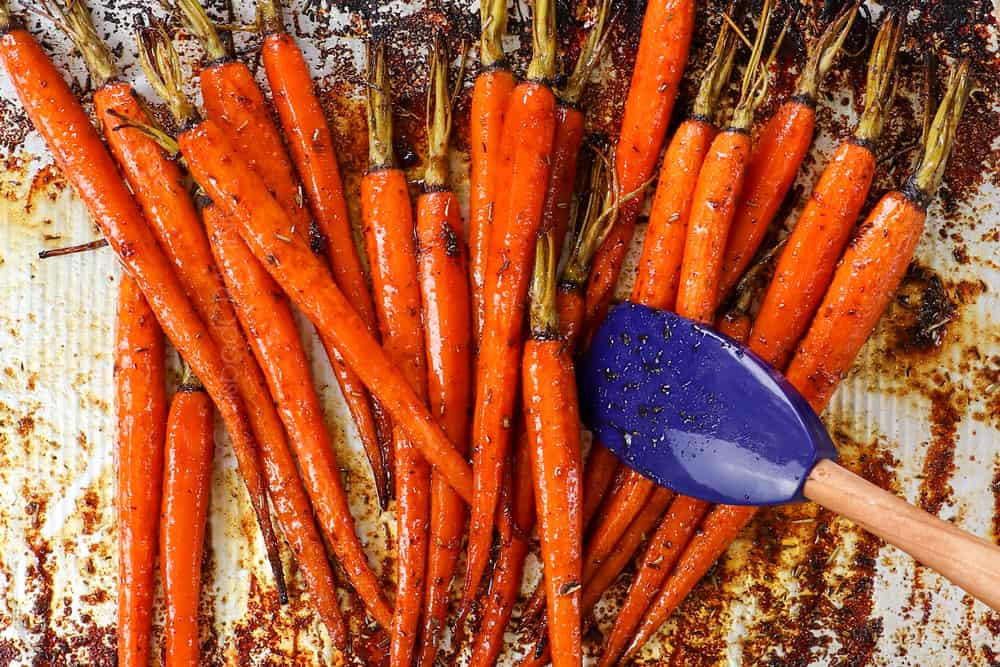 In a small bowl, mix the remaining balsamic vinegar and honey, then drizzle it over the roasted carrots. Toss gently to coat evenly