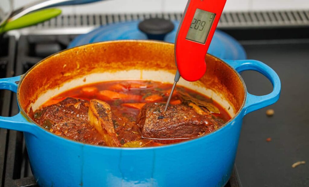 Remove the roast and shred it. Serve with the vegetables and spoon the rich sauce over the top. Thicken the sauce if desired using cornstarch or flour.