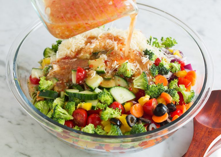 Pour the Italian dressing over the mixture and toss thoroughly until everything is evenly coated