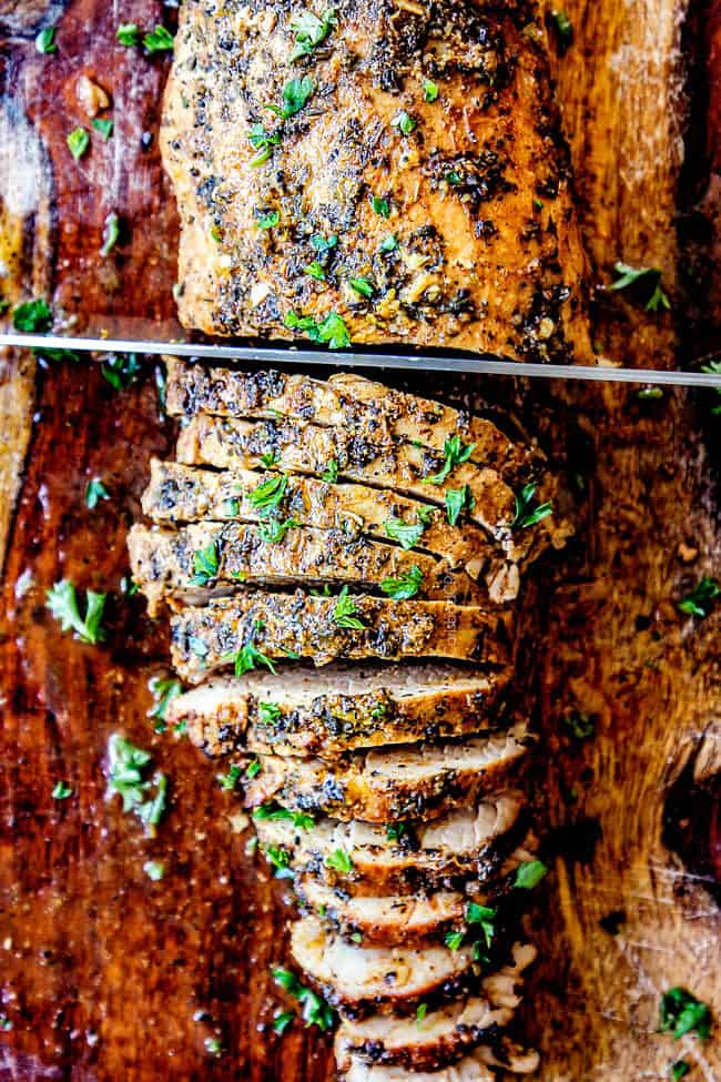 Remove from the oven, loosen the foil slightly, and let the pork rest before slicing and serving with the butter sauce