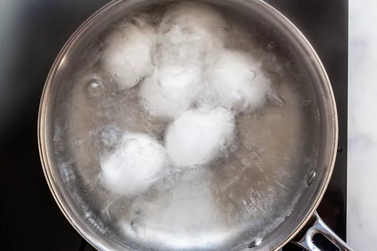 Set the pan over high heat and bring the water to a rolling boil without covering the pan