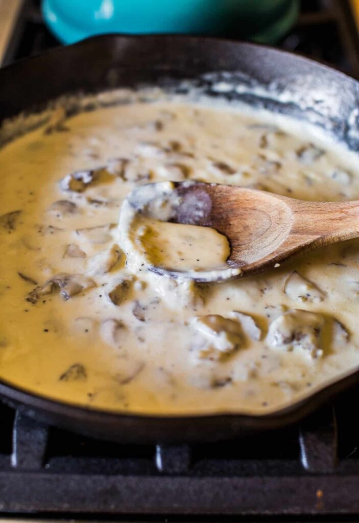 Sprinkle flour over the mixture and stir until absorbed