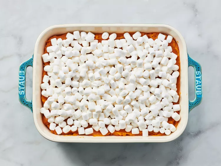Sprinkle the miniature marshmallows evenly over the surface, making sure to cover the entire top layer