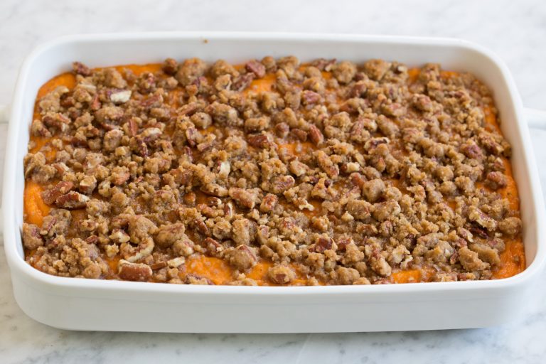 Sprinkle the topping evenly over the sweet potato layer, ensuring full coverage