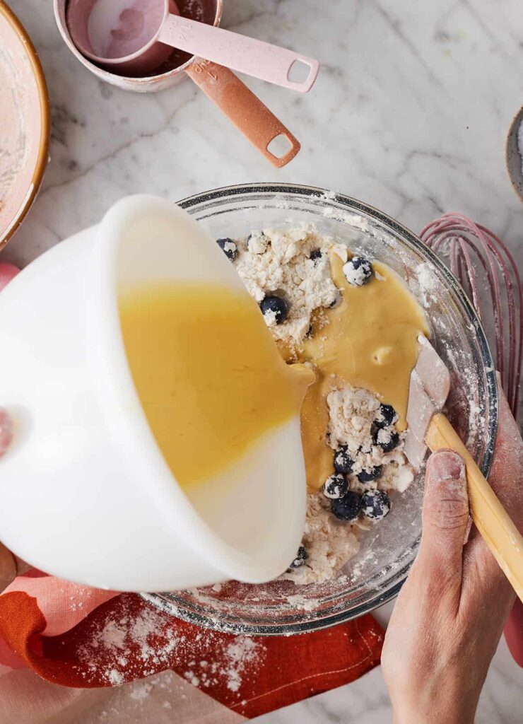 In a separate bowl, whisk together the buttermilk, egg, and vanilla extract. Pour this mixture into the dry ingredients and stir gently with a spatula until a shaggy dough forms. Use your hands to bring everything together, making sure there are no dry pockets. Adjust with a little extra flour if too sticky or a splash of buttermilk if too dry.